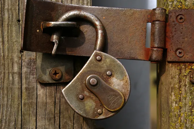 An open padlock. Photo.