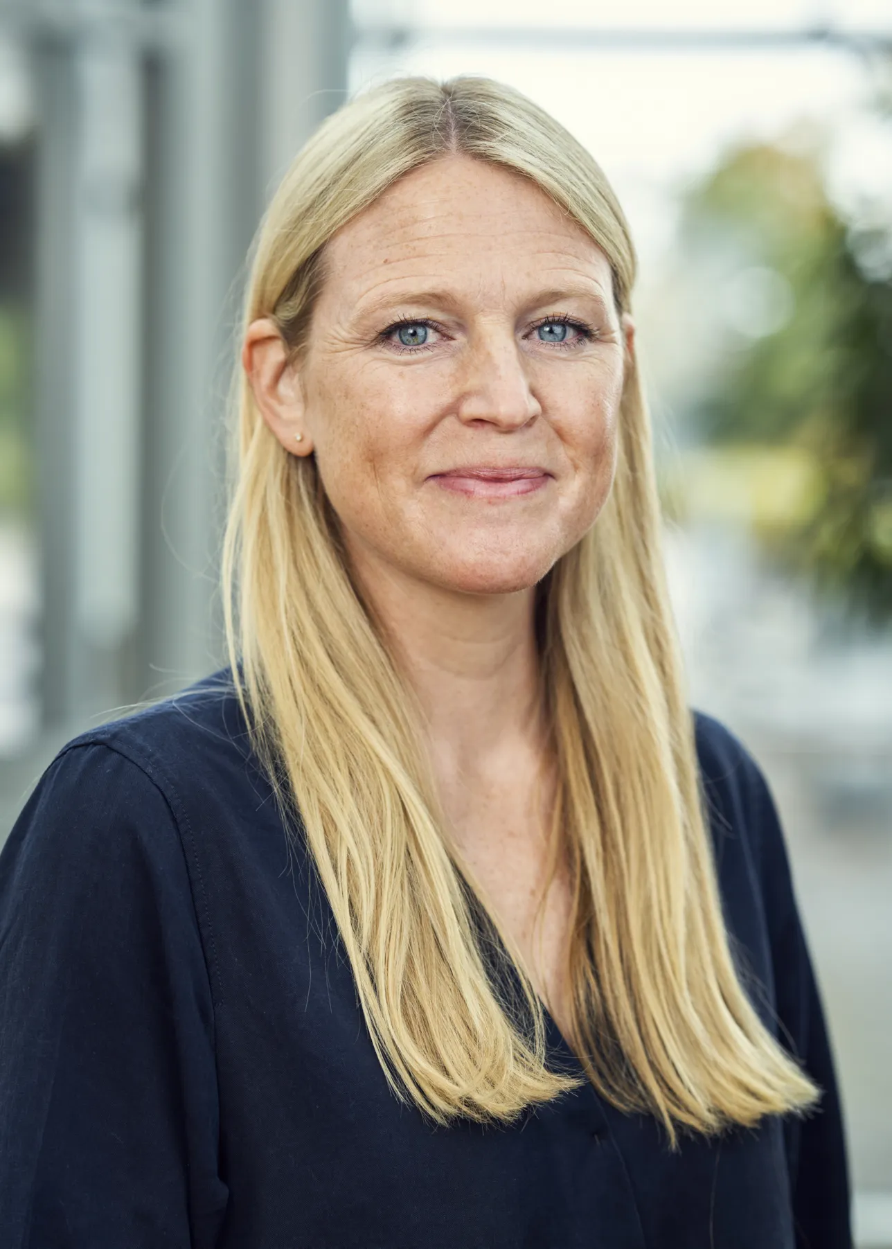 Porträttfoto kvinna.